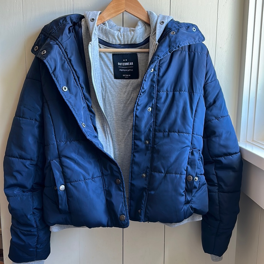 Outerwear Jacket with removable hood.